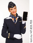 RUSSIA, MOSCOW: 21 SEPTEMBER 2019. Beautiful stewardess dressed in official blue uniform of Aeroflot Airlines. Редакционное фото, фотограф Андрей Аркуша / Фотобанк Лори