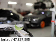 Sanded car par prepared for painting in auto repair shop. Стоковое фото, фотограф Яков Филимонов / Фотобанк Лори
