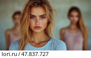 Three young women stand closely together, showcasing a blend of confidence and beauty with soft sunlight illuminating their features. Стоковое AI-изображение, AI-художник Данила Большаков / Фотобанк Лори