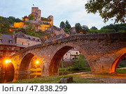 Old stony bridge dated 15th century over Aveyron river. Les Plus Beaux Villages de France (Most beautiful villages of France). Belcastel. France. Стоковое фото, фотограф Яков Филимонов / Фотобанк Лори