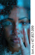 A woman with curly hair presses her hand against a luminous surface, mesmerized by colorful light patterns reflecting around her. Стоковое AI-изображение, AI-художник Данила Большаков / Фотобанк Лори