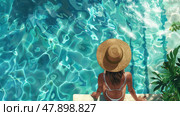 A woman sits at the edge of a beautiful pool, soaking in the sun and tranquility amidst lush foliage. Стоковое AI-изображение, AI-художник Данила Большаков / Фотобанк Лори