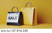 Two shopping bags with the word Sale written on them. Стоковое AI-видео, аниматор Sergey Grishin / Фотобанк Лори