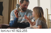 Happy Father Playing with Daughter. Three Years Baby Smiling, Laughing, Looking at Daddy. Man Showing Affection to Child. Candid Real Emotion. Beard Dad and Little Kid Girl. Authentic Family Lifestyle. Стоковое видео, видеограф Марина Демидюк / Фотобанк Лори