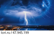 A mesmerizing shot of lightning illuminating the night sky during a thunderstorm over the city. Стоковое AI-видео, аниматор Михаил Строгалев / Фотобанк Лори