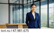 A businesswoman at a conference. An employee is in the meeting room. Стоковое AI-изображение, AI-художник Антон Слабоспицкий / Фотобанк Лори