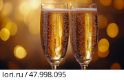 Two fluted glasses filled with sparkling beverage create a festive atmosphere with a soft golden bokeh backdrop, perfect for celebration moments. Стоковое AI-изображение, AI-художник Данила Большаков / Фотобанк Лори