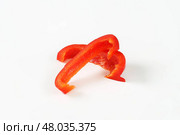 Two slices of red bell pepper. Стоковое фото, фотограф Alena Dvorakova / PantherMedia / Фотобанк Лори