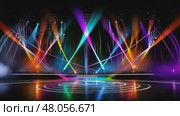 Empty stage illuminated by moving colorful laser beams. Стоковое AI-видео, аниматор Юрий Поздников / Фотобанк Лори