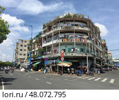 Apartment building in Ho Chi Minh City, Vietnam (2017 год). Редакционное фото, фотограф Александр Подшивалов / Фотобанк Лори