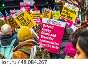 Street protest with activists holding signs advocating political change. London, UK, 16 March 2024. Редакционное фото, фотограф Zydrius Tartenis / Фотобанк Лори