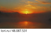 Landscape with sunrise over river. Стоковое видео, видеограф Михаил Коханчиков / Фотобанк Лори