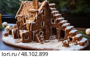 wonky gingerbread house fail ai generated. Стоковое AI-изображение, AI-художник Vectorwin / Фотобанк Лори