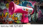 protests pink megaphone ai generated. Стоковое AI-изображение, AI-художник Vectorwin / Фотобанк Лори