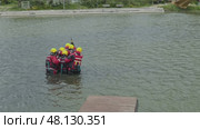 3 may 2025, Lisbon. Portugal - Traininh - Rescue team performing huddle maneuver in water training exercise. Редакционное видео, видеограф Константин Шишкин / Фотобанк Лори