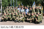 Russia Orenburg region July 3, 2005: photograph of a group of cadets with commanders after taking the oath on the parade ground. Редакционное фото, фотограф Акиньшин Владимир / Фотобанк Лори