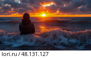 A person sits quietly at the shoreline, watching a vibrant sunset with colorful clouds and crashing waves during a peaceful evening by the ocean. Стоковое AI-изображение, AI-художник Данила Большаков / Фотобанк Лори