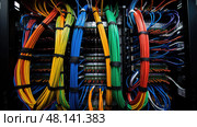 disorganized cable mess ai generated. Стоковое AI-изображение, AI-художник Vectorwin / Фотобанк Лори