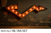 metal arrow with lights ai generated. Стоковое AI-изображение, AI-художник Vectorwin / Фотобанк Лори