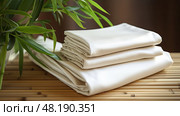 soft bamboo bed sheets ai generated. Стоковое AI-изображение, AI-художник Vectorwin / Фотобанк Лори