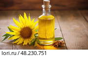 yellow safflower oil ai generated. Стоковое AI-изображение, AI-художник Vectorwin / Фотобанк Лори