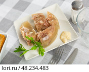 Portion of fresh kholodets on dinning table. Стоковое фото, фотограф Яков Филимонов / Фотобанк Лори