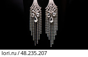 dangle silver bling ai generated. Стоковое AI-изображение, AI-художник Vectorwin / Фотобанк Лори