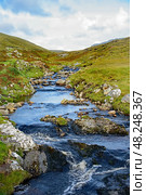 Small river in An Port, County Donegal, Ireland (2024 год). Стоковое фото, фотограф Татьяна Кахилл / Фотобанк Лори