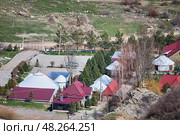Recreation center with a small pool, guest houses and yurts, view from above. Стоковое фото, фотограф Екатерина Якименко / Фотобанк Лори