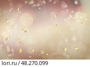 Абстрактный праздничный фон с боке и золотым конфетти. Стоковое фото, фотограф Римма Тельнова / Фотобанк Лори