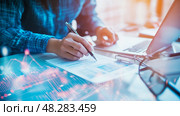 Analyzing Data: Charting Success, Strategy paperwork for business planning. Стоковое AI-изображение, AI-художник Данила Большаков / Фотобанк Лори