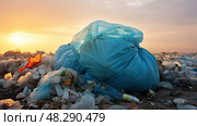 pollution blue plastic bag ai generated. Стоковое AI-изображение, AI-художник Vectorwin / Фотобанк Лори
