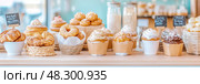 Delicious Pastries: Sweet Temptations Display, Bakery showcase sweets, perfect for shop promotion or culinary project, delightful array of treats. Стоковое AI-изображение, AI-художник Данила Большаков / Фотобанк Лори