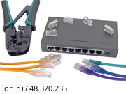 Роутер, кабельный тестер и соединительные кабели. Closeup of network cables connected to router on white. Стоковое фото, фотограф Татьяна Д / Фотобанк Лори