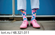 mismatched pink and blue socks ai generated. Стоковое AI-изображение, AI-художник Vectorwin / Фотобанк Лори