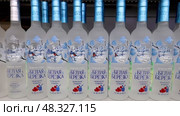 Belaya Berezka Russian Vodka on the shelf in a superstore. Редакционное видео, видеограф FotograFF / Фотобанк Лори