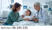 Hospital scene with a girl, her mother and  doctors. Mother touching daughters stomach. Healthcare and medicine. Стоковое AI-изображение, AI-художник Катерина Ковалева / Фотобанк Лори