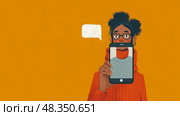 A young individual with curly hair and glasses smiles while holding a smartphone in front of their face, against a bright orange backdrop. Стоковое AI-изображение, AI-художник Данила Большаков / Фотобанк Лори