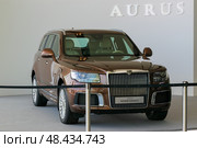Aurus Komendant luxury premium SUV on display at an exhibition stand. Редакционное фото, фотограф Антон Вахрушев / Фотобанк Лори