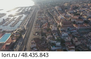 Aerial photo of Spanish town El Masnou with view of buildings along seashore and quay. Стоковое видео, видеограф Яков Филимонов / Фотобанк Лори