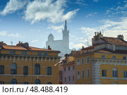 Basilique Notre-Dame de la Garde in the foggy background with red tiled roof Marseille houses (2018 год). Стоковое фото, фотограф Сергей Богомяко / Фотобанк Лори