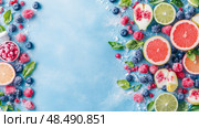 Colorful Citrus & Berry Medley: A Refreshing Summer Snack Still Life. Стоковое AI-изображение, AI-художник Данила Большаков / Фотобанк Лори