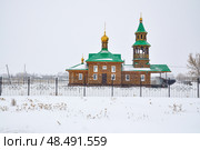 Церковь святого апостола Андрея Первозваного зимой во время снегопада. Село Вагай. Омутинский район. Тюменская область (2018 год). Стоковое фото, фотограф Александр Тараканов / Фотобанк Лори