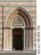 MESSINA, ITALY - NOVEMBER 06, 2018 - Elements of decoration of the doors of the Bell Tower of the Cathedral of Messina, Sicily. Стоковое фото, фотограф Сергей Богомяко / Фотобанк Лори