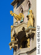 MESSINA, ITALY - NOVEMBER 06, 2018 - Decorations and golden elements of the Bell Tower of the Cathedral of Messina, Sicily. Стоковое фото, фотограф Сергей Богомяко / Фотобанк Лори