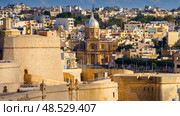 VALLETTA, MALTA - NOVEMBER 12, 2018 - Panoramic view of the Grand Harbor Tricity bay, Birgu and Senglea islands with ships and boats in the port. Стоковое фото, фотограф Сергей Богомяко / Фотобанк Лори