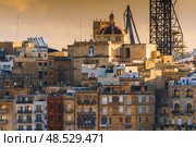 VALLETTA, MALTA - NOVEMBER 12, 2018 - Panoramic view of the Grand Harbor Tricity bay, Birgu and Senglea islands with ships and boats in the port. Стоковое фото, фотограф Сергей Богомяко / Фотобанк Лори