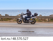 Motorcyclist on a motorcycle on a tourist trip. Стоковое фото, фотограф Юрий Бизгаймер / Фотобанк Лори