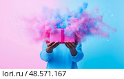 Exploding Surprise: A Gift Unveiled in a Burst of Color and Joy, For a Celebration. Стоковое AI-изображение, AI-художник Данила Большаков / Фотобанк Лори