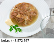 Bowl of homemade pork aspic, meat jelly. Стоковое фото, фотограф Яков Филимонов / Фотобанк Лори